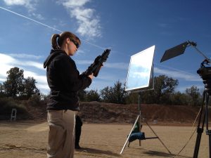 Sara Ahrens checking out a Kriss Vector at a taping of 'Shooting Gallery'