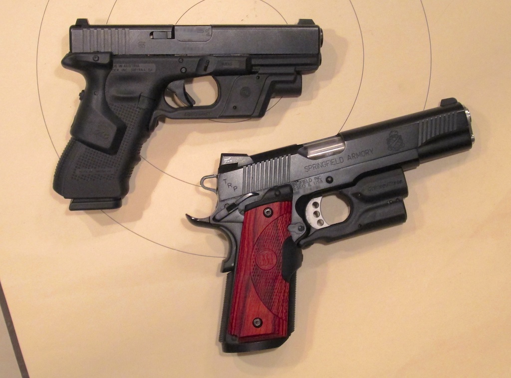 Hmmm. Tough choice. Both pistols have compatible light and laser features.