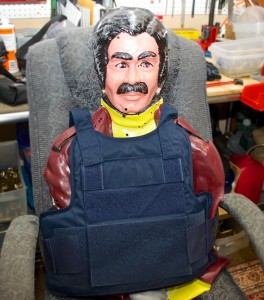 Is he a plastic Saddam Hussein or a 1970s Porn Star? We don't know, but either way he's protected with Engarde Body Armor.