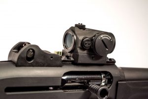 The Aimpoint Micro H1 optic fit perfectly and allowed for co-witness of the ghost ring sights.