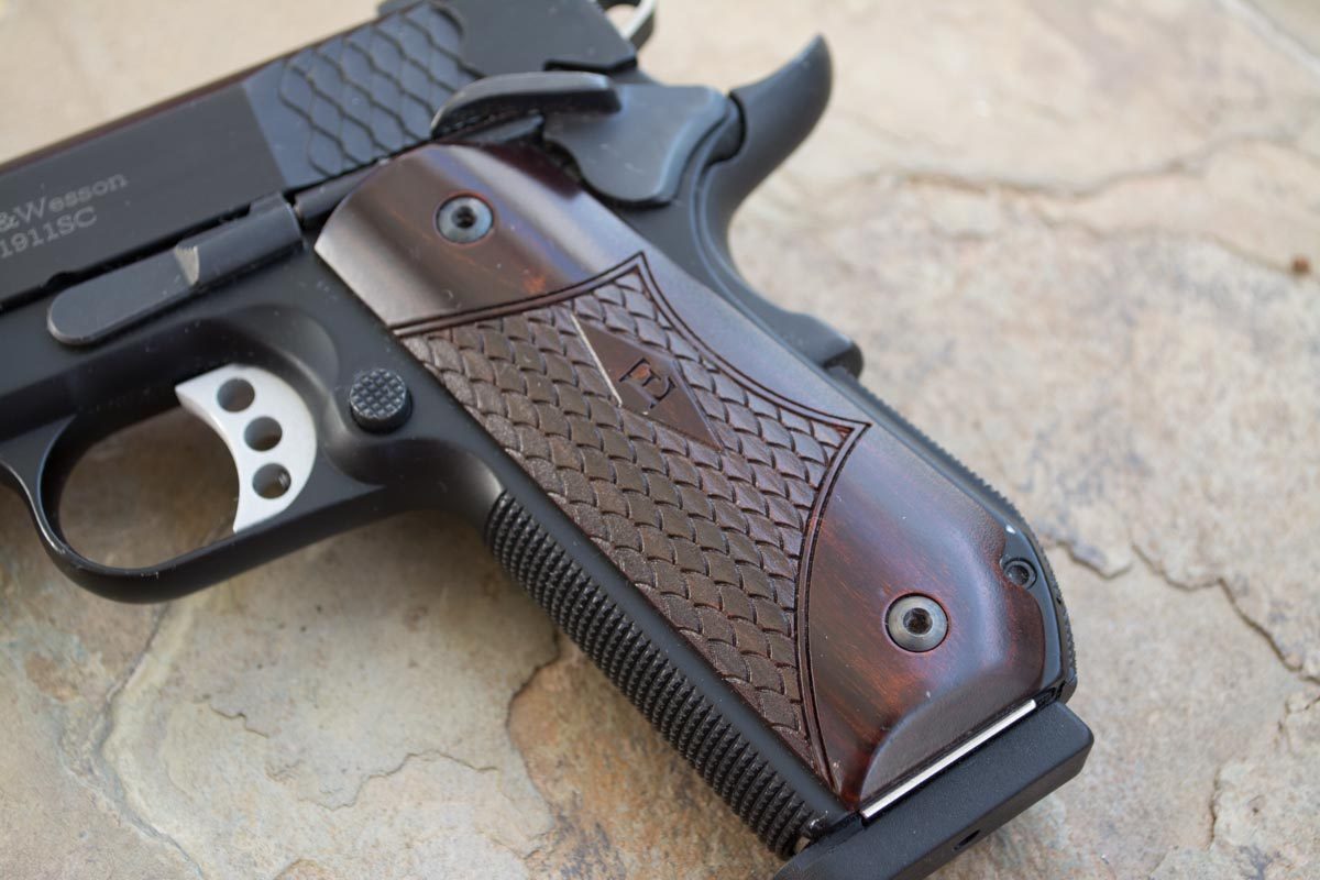 The rounded butt of the SW1911 Sc helps with concealment and
</p srcset=