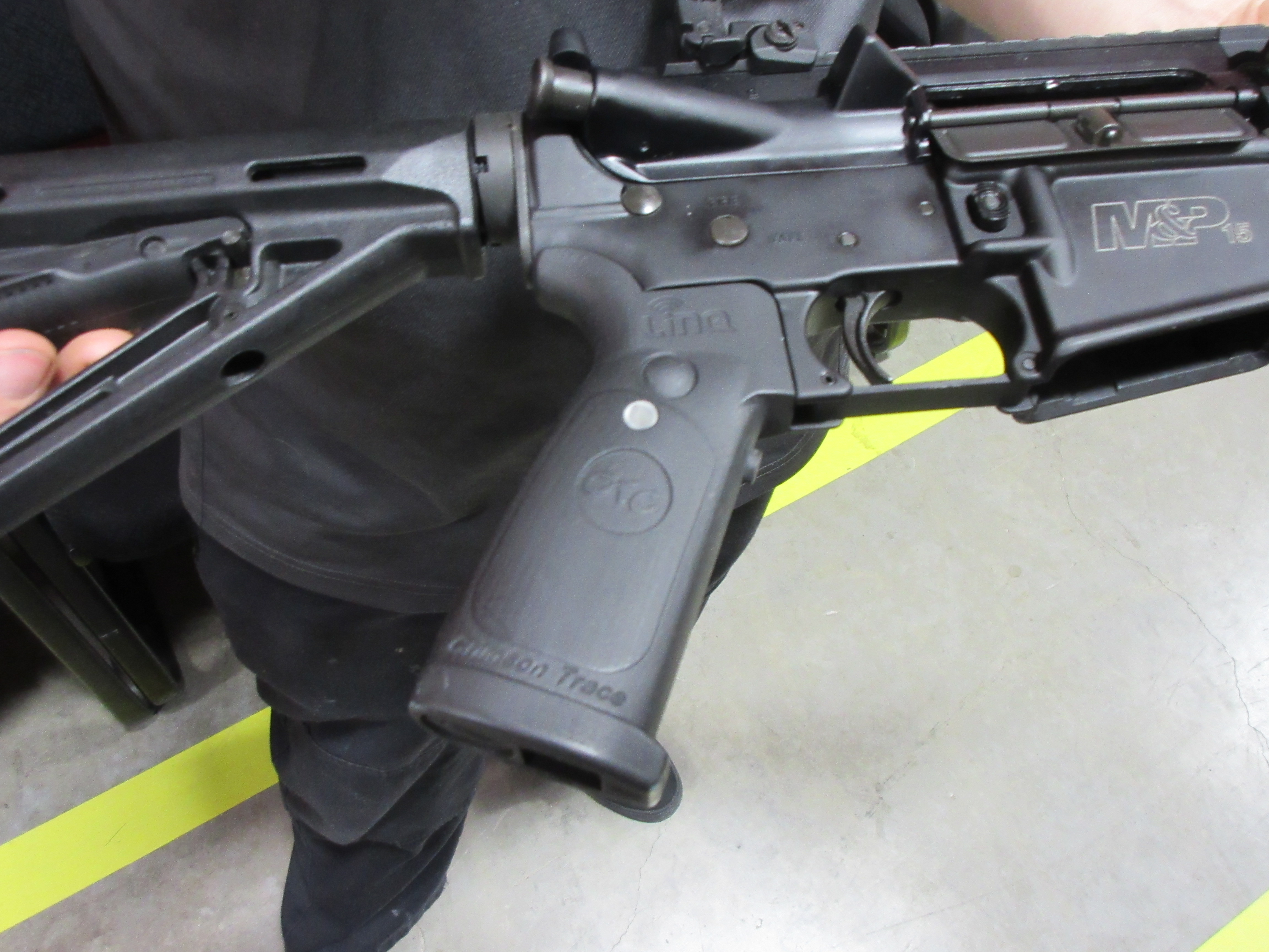 Operating controls of the Crimson Trace LinQ are on the pistol grip for instinctive activation.