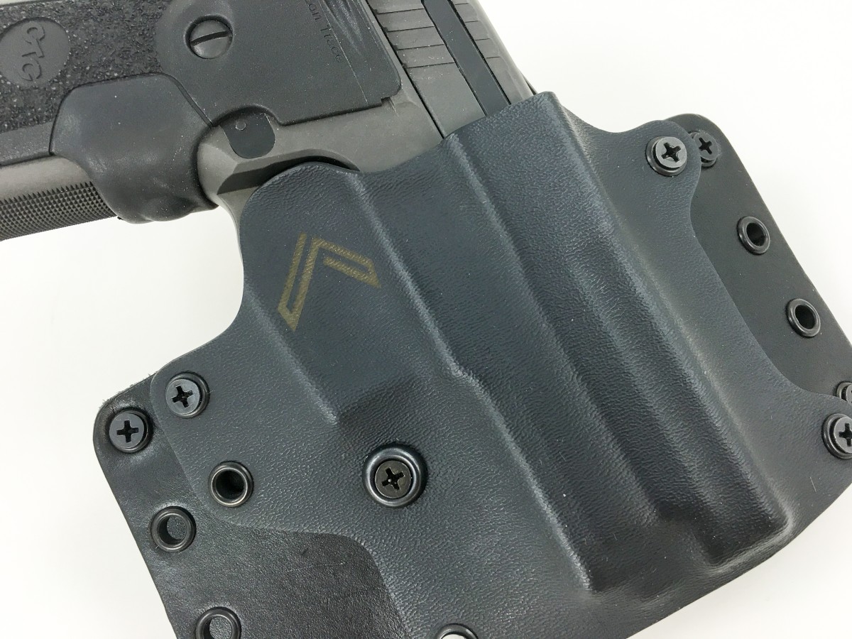 This Blackpoint outside-the-waistband holster is built like a tank and uses both leather and Kydex components. Note the screw nearest the center – that’s for adjusting the tension on your gun. Loosen it for an easier draw or tighten for more gun retention.