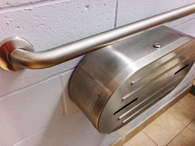 bathroom toilet dispenser and guard rail